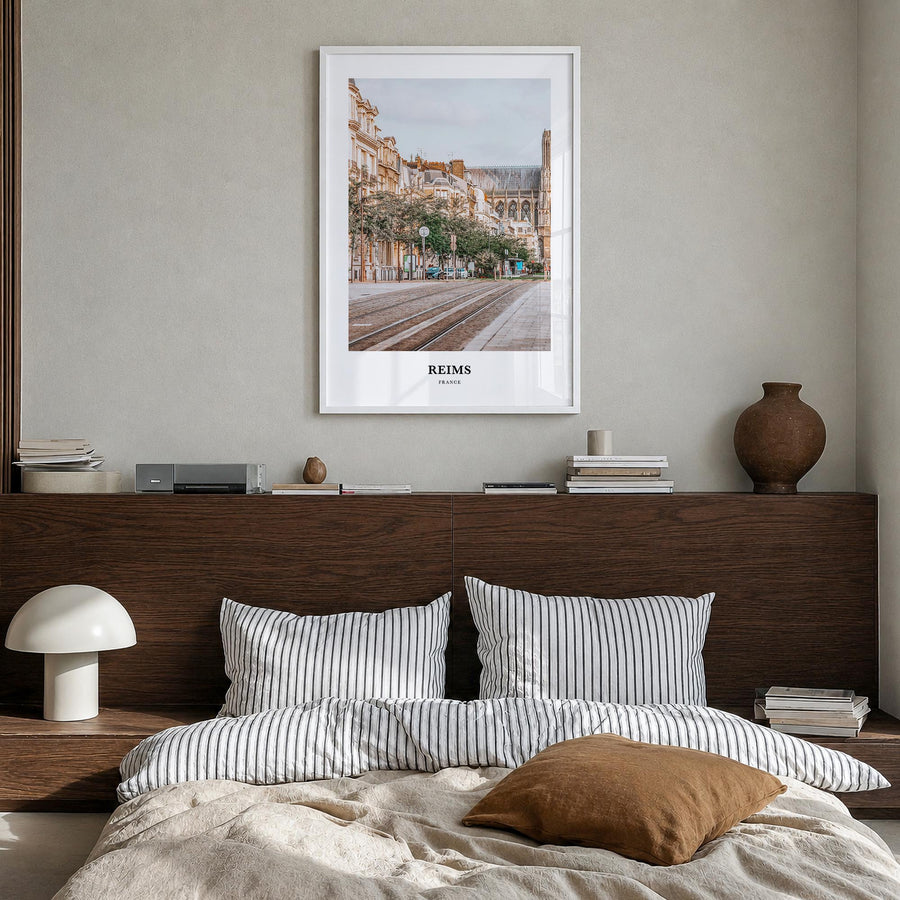 Reims colorful classic poster of France – vertical wall art in white wood frame, hanging on wall