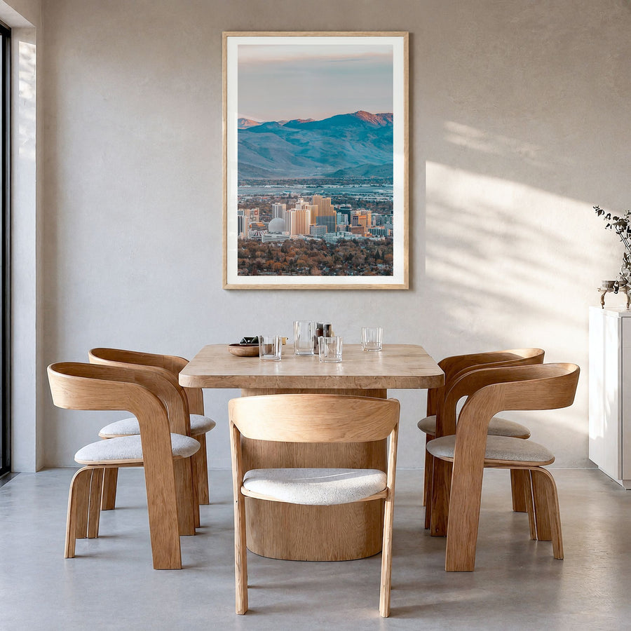 Reno Photo Poster in a natural wood frame, hanging in a dining room, white border