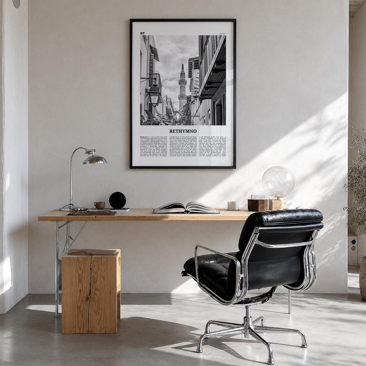 Rethymno black & white newspaper poster of Greece – vertical wall art in black wood frame, hanging on wall