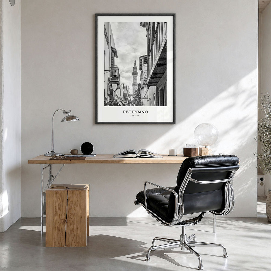 Rethymno Classic Poster in a black wood frame, hanging in a bright home office