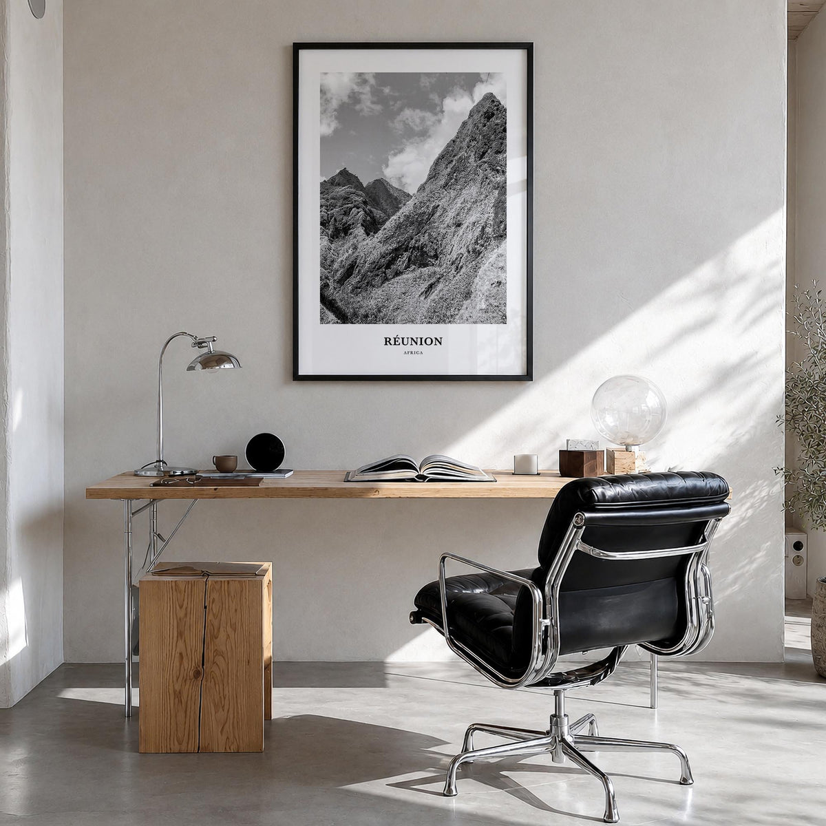 Réunion black & white classic poster of Africa – vertical wall art in black wood frame, hanging on wall