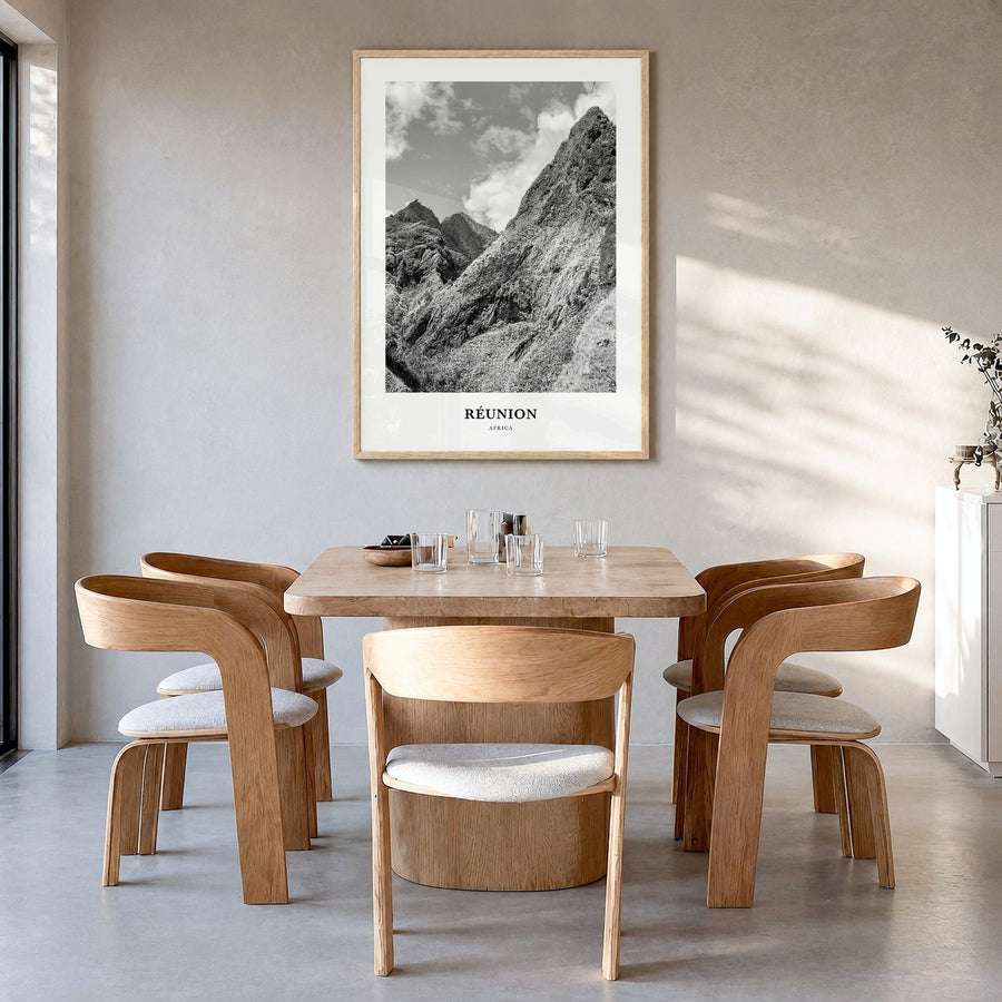 Réunion Classic Poster in a natural wood frame, hanging in a dining room
