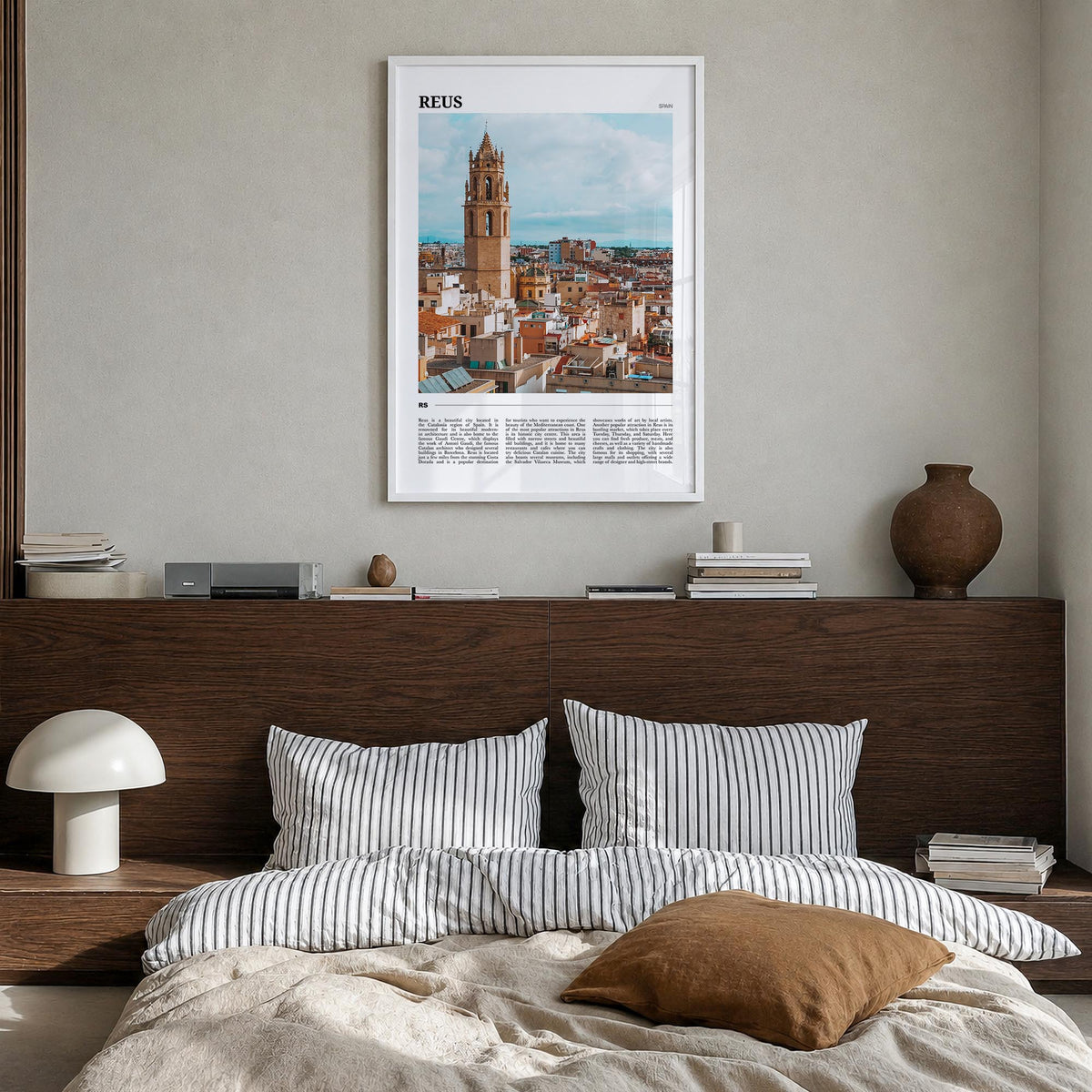 Reus colorful travel poster of Spain – vertical wall art in white wood frame, hanging on wall