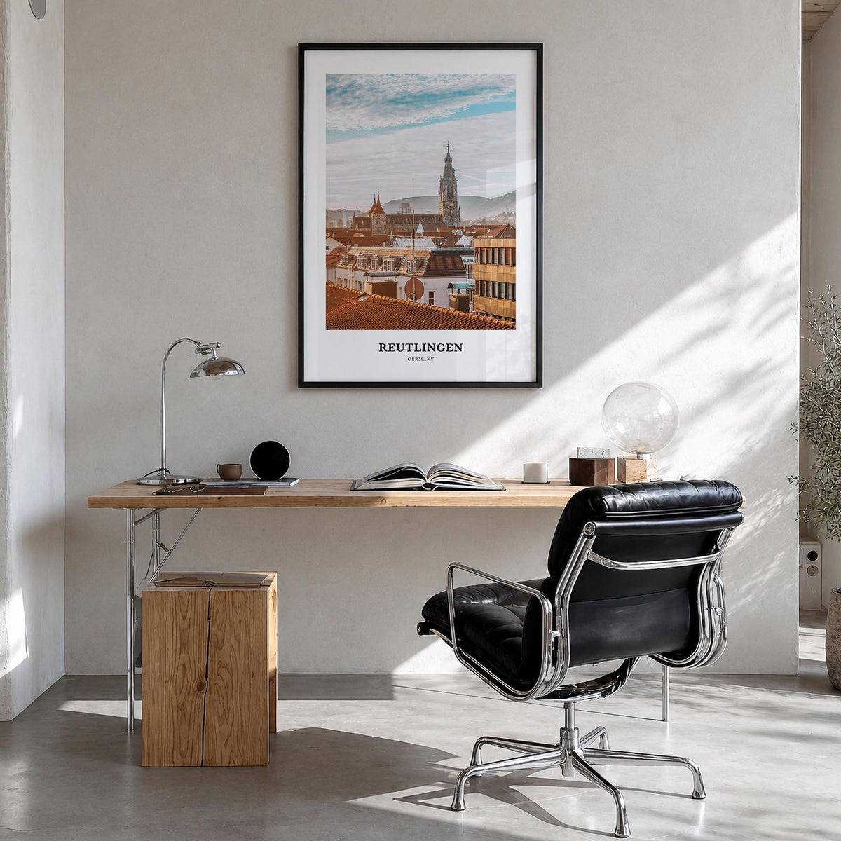 Reutlingen colorful classic poster of Germany – vertical wall art in black wood frame, hanging on wall