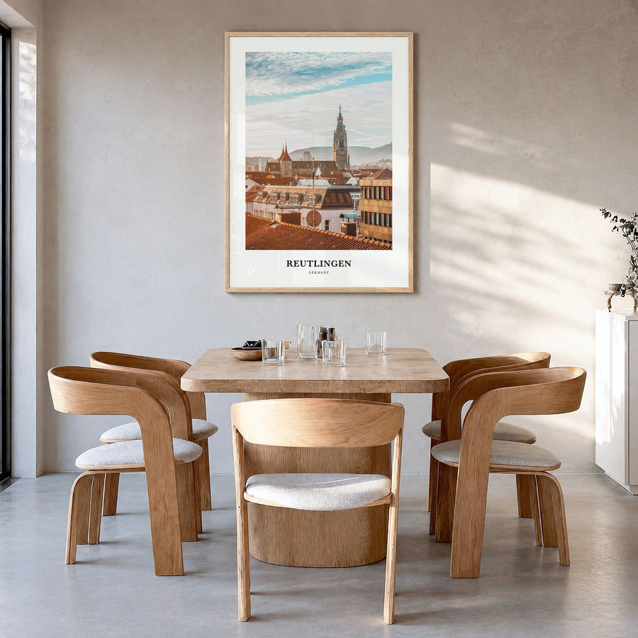 Reutlingen Classic Poster in a natural wood frame, hanging in a dining room
