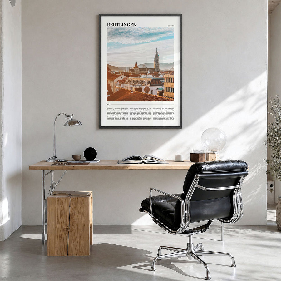 Reutlingen Travel Poster in a black wood frame, hanging in a bright home office