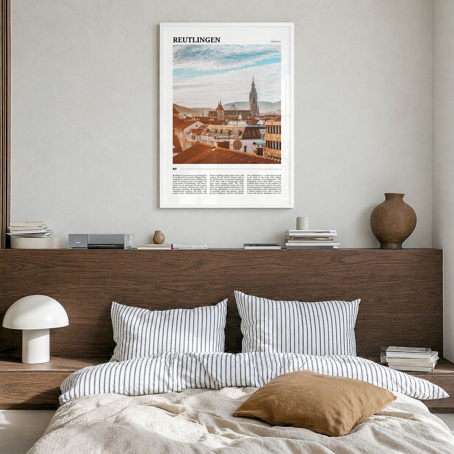 Reutlingen Travel Poster in a white wood frame, hanging in a bedroom