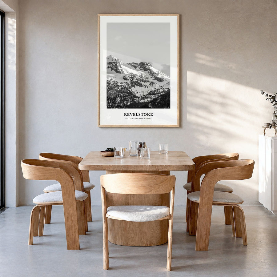 Revelstoke Classic Poster in a natural wood frame, hanging in a dining room