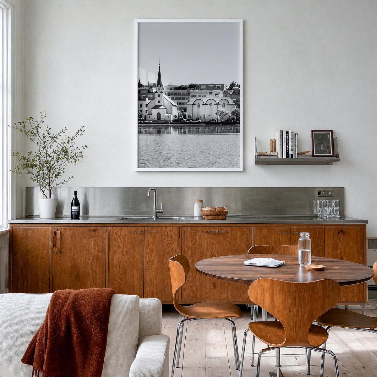 Reykjavík black & white photo poster of Iceland – vertical wall art in white wood frame, hanging on wall