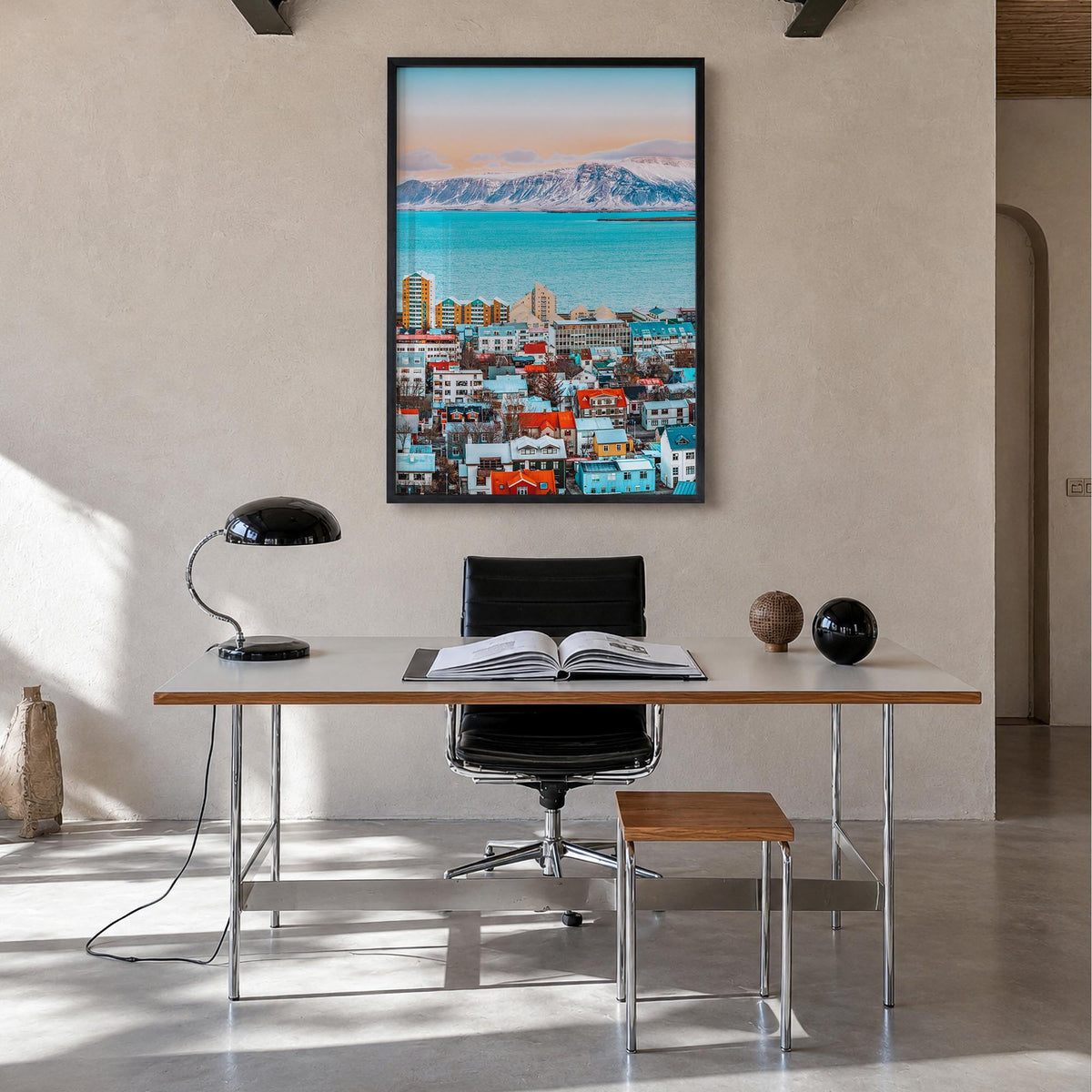 Reykjavík colorful photo poster of Iceland – vertical wall art in black wood frame, hanging on wall