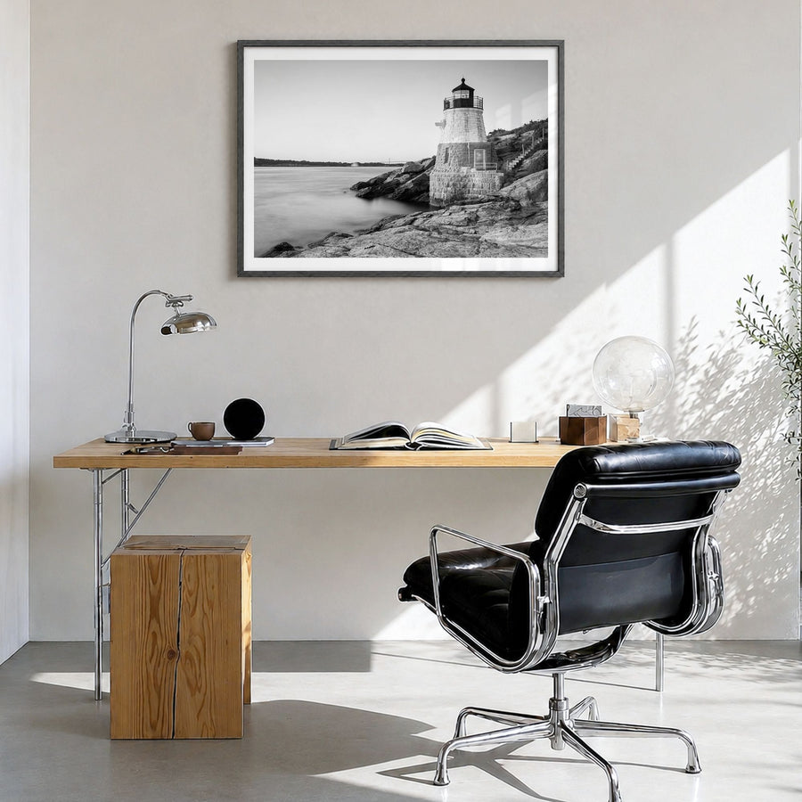 Rhode Island Photo Poster in a black wood frame, hanging in a bright home office, white border