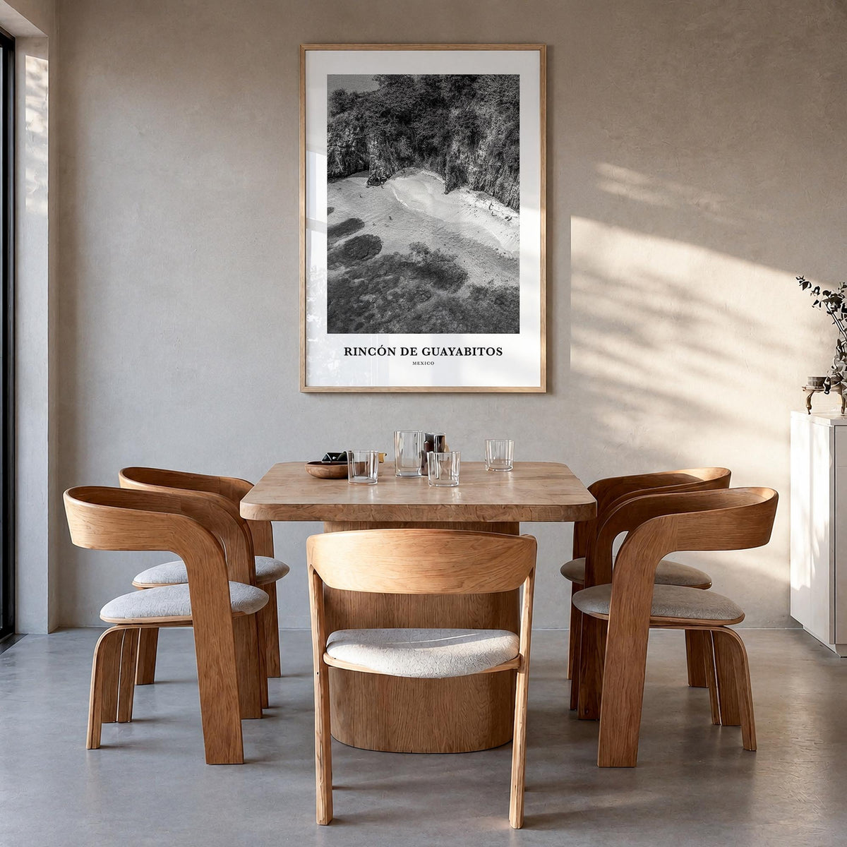 Rincón de Guayabitos black & white classic poster of Mexico – vertical wall art in natural wood frame, hanging on wall