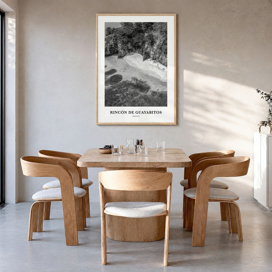 Rincón de Guayabitos Classic Poster in a natural wood frame, hanging in a dining room