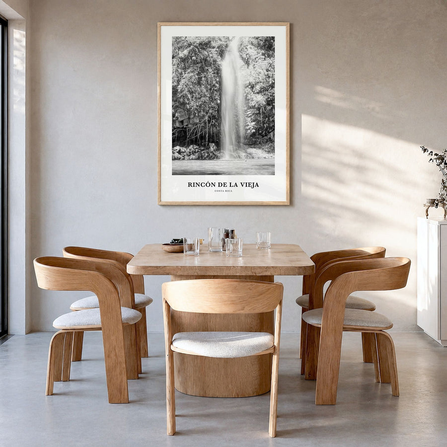 Rincón de la Vieja Classic Poster in a natural wood frame, hanging in a dining room