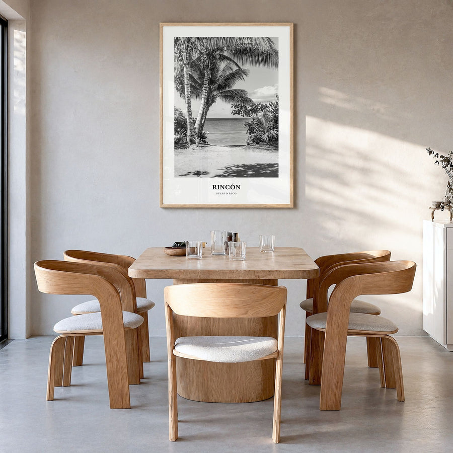 Rincón Classic Poster in a natural wood frame, hanging in a dining room