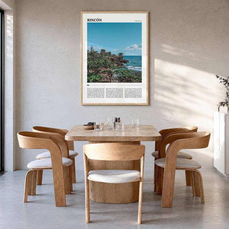 Rincón Travel Poster in a natural wood frame, hanging in a dining room