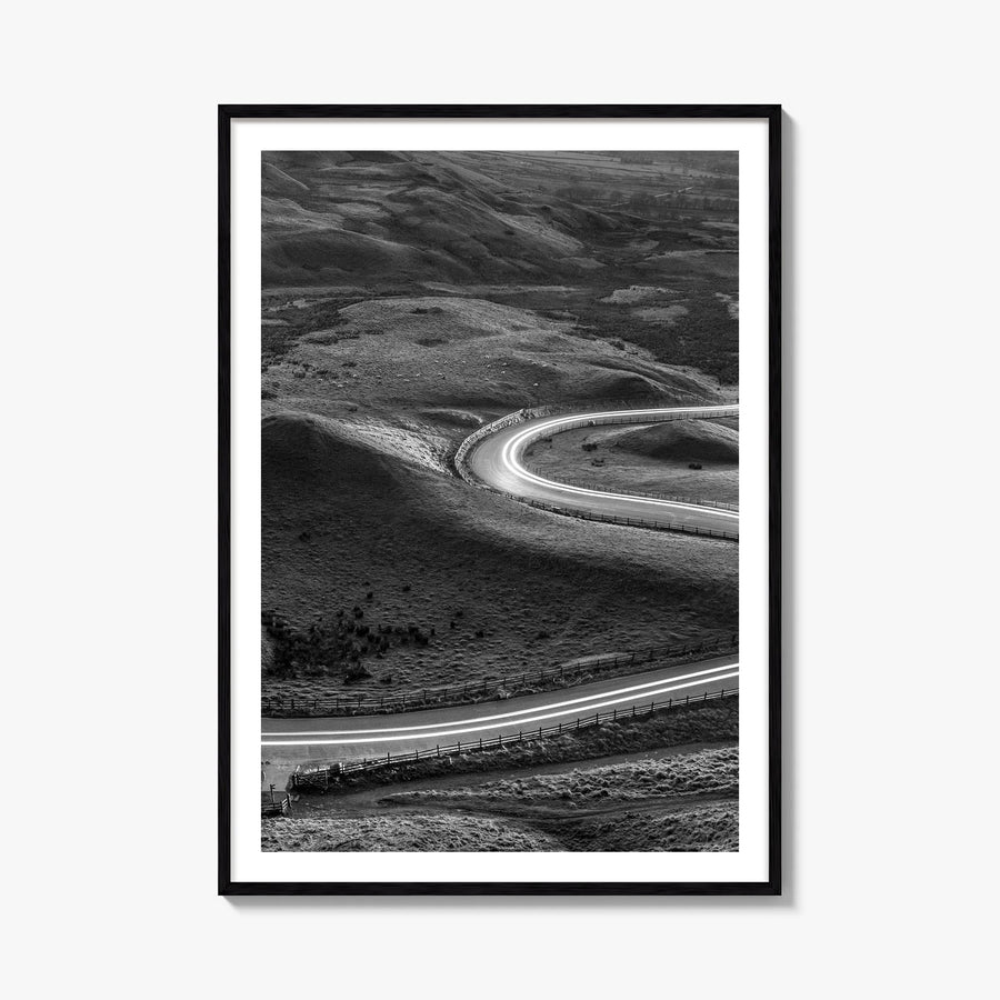 Road black & white photo poster – vertical wall art, unframed print shown in interior mockup
