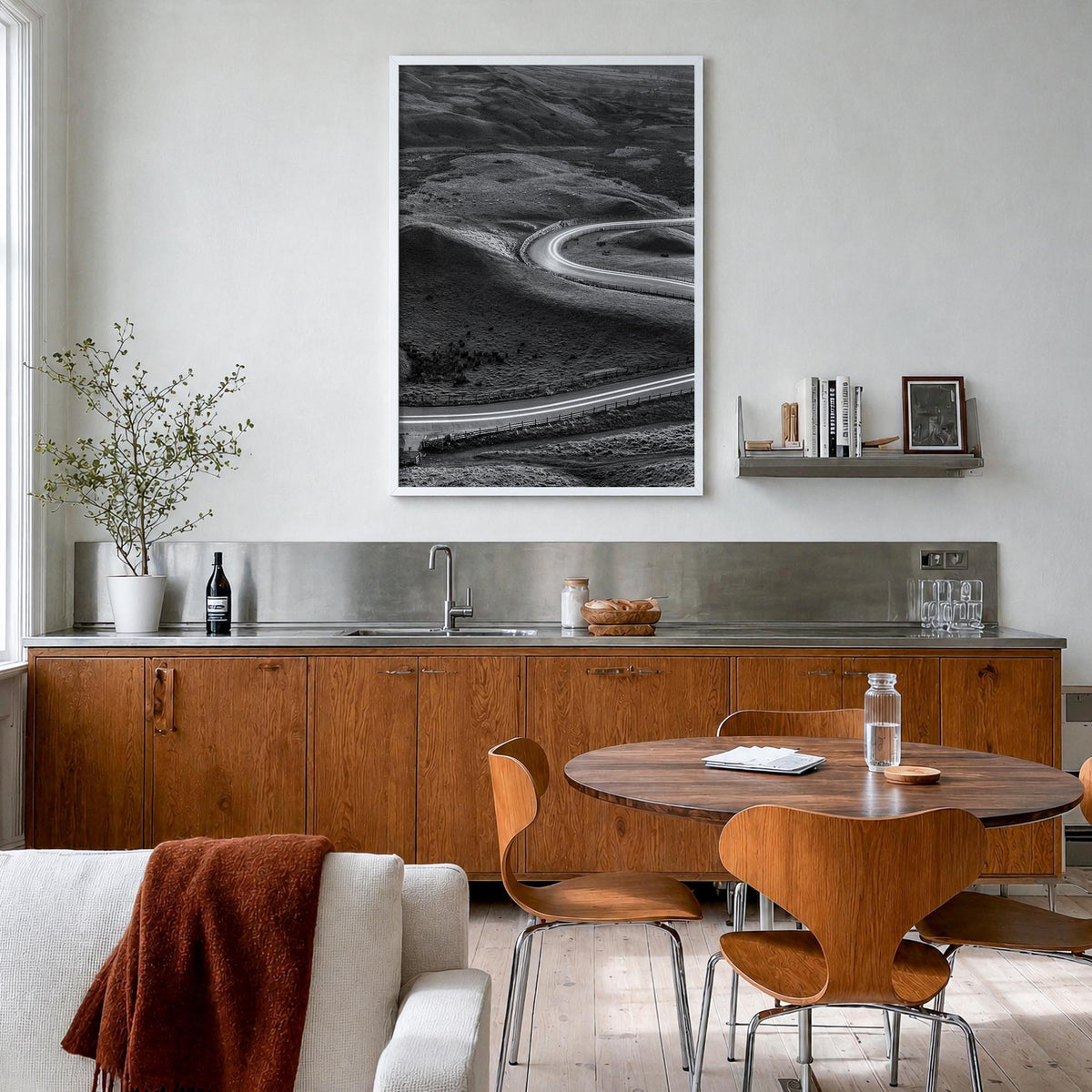 Road black & white photo poster – vertical wall art in white wood frame, hanging on wall