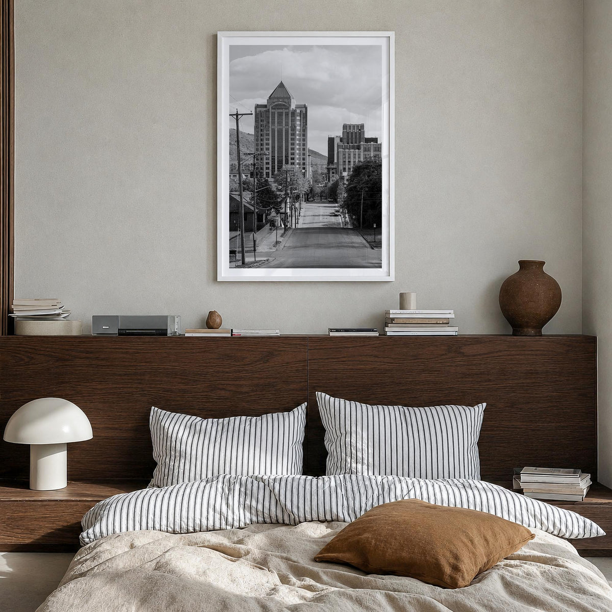 Roanoke black & white photo poster of Virginia, USA – vertical wall art in white wood frame with white border, hanging on wal