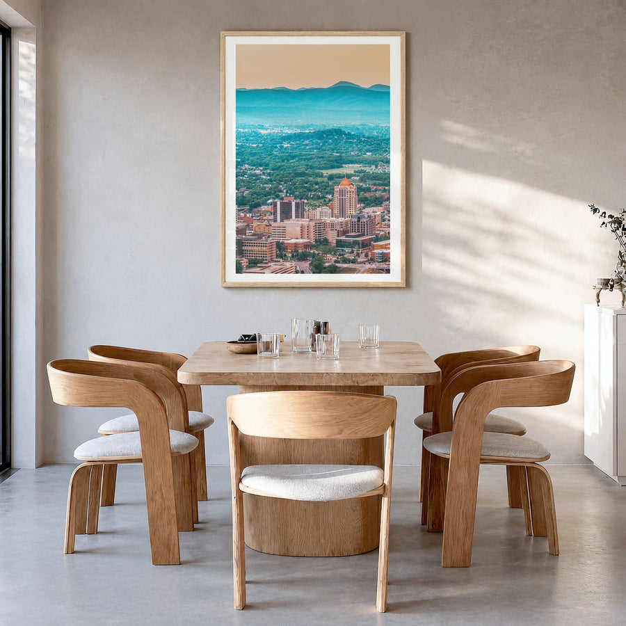 Roanoke Photo Poster in a natural wood frame, hanging in a dining room, white border