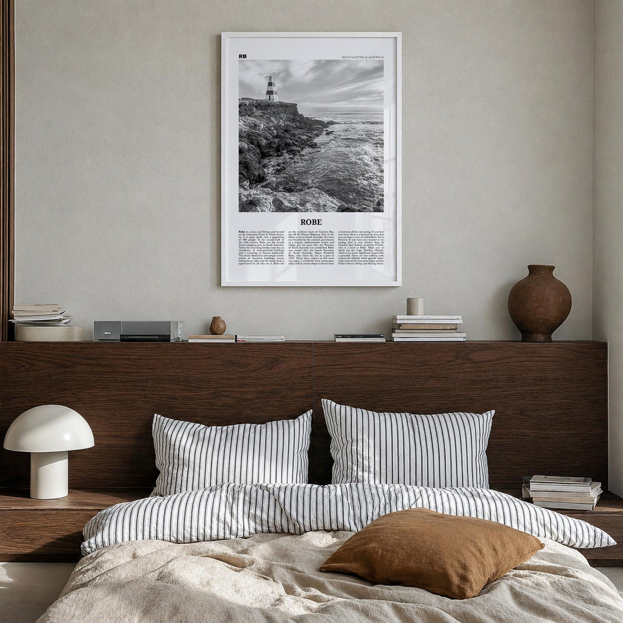 Robe black & white newspaper poster of Australia – vertical wall art in white wood frame, hanging on wall