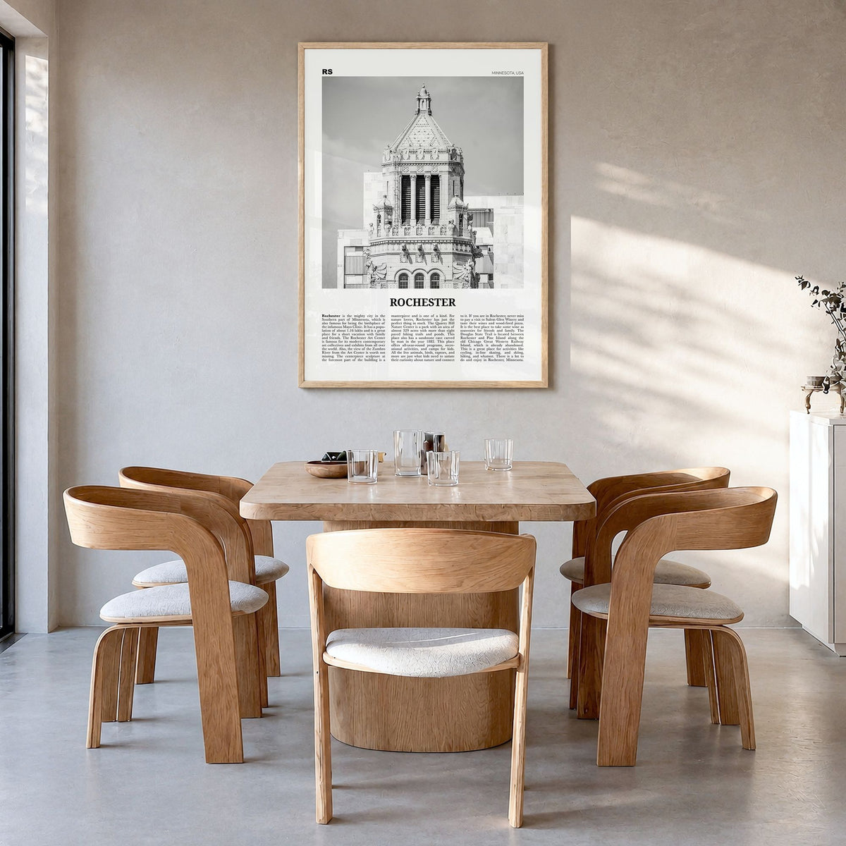 Rochester, Minnesota Newspaper Poster in a natural wood frame, hanging in a dining room
