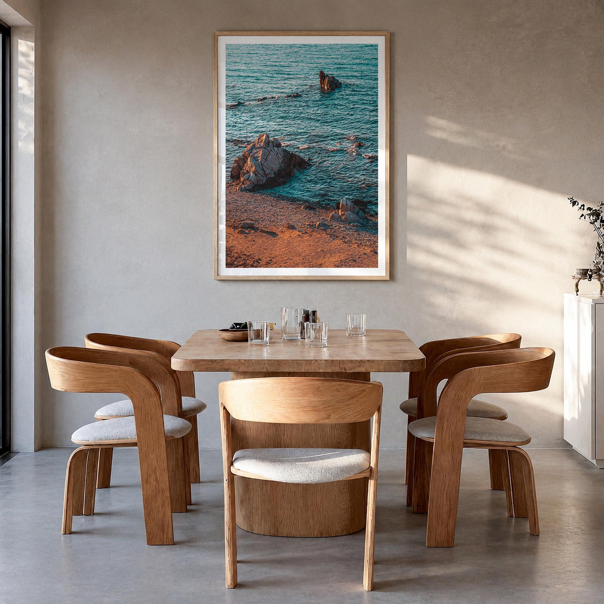 Rock Beach colorful photo poster – vertical wall art in natural wood frame with white border, hanging on wall
