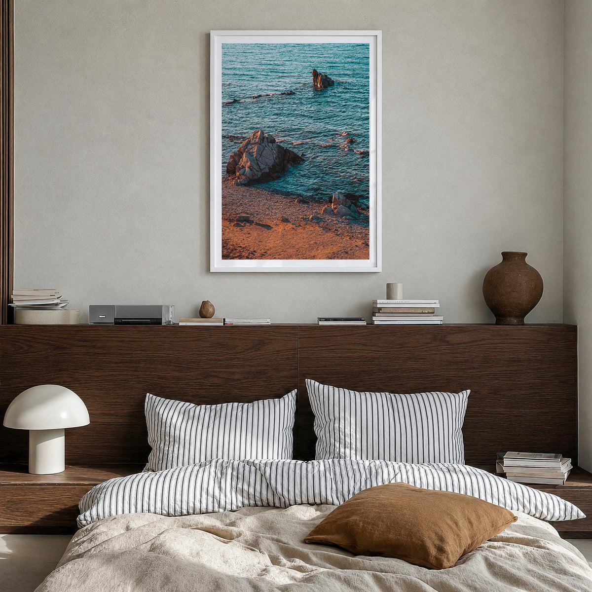 Rock Beach colorful photo poster – vertical wall art in white wood frame with white border, hanging on wall