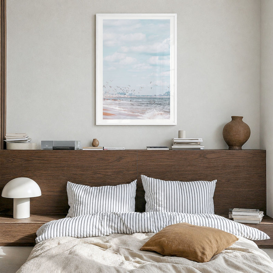 Rockaway Beach Photo No 1 Poster in a white wood frame, hanging in a bedroom, white border