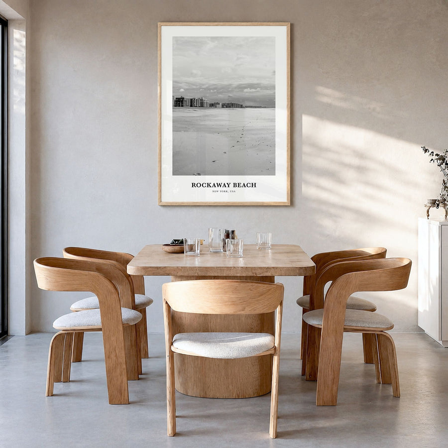Rockaway Beach Classic Poster in a natural wood frame, hanging in a dining room
