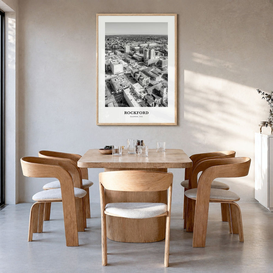 Rockford Classic Poster in a natural wood frame, hanging in a dining room