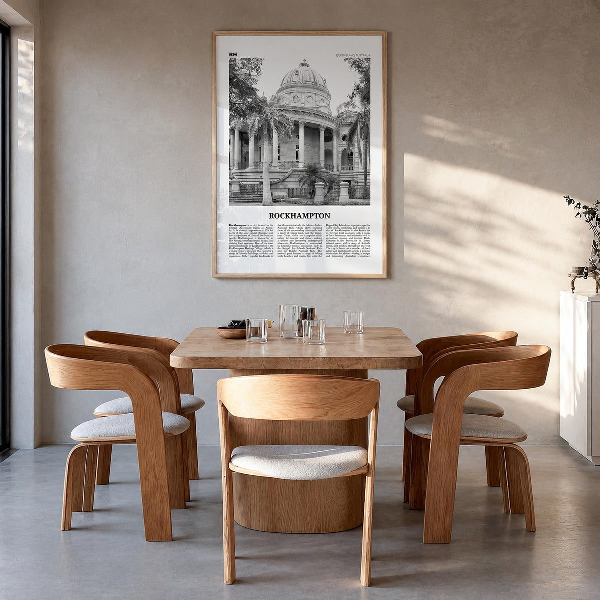 Rockhampton black & white newspaper poster of Australia – vertical wall art in natural wood frame, hanging on wall