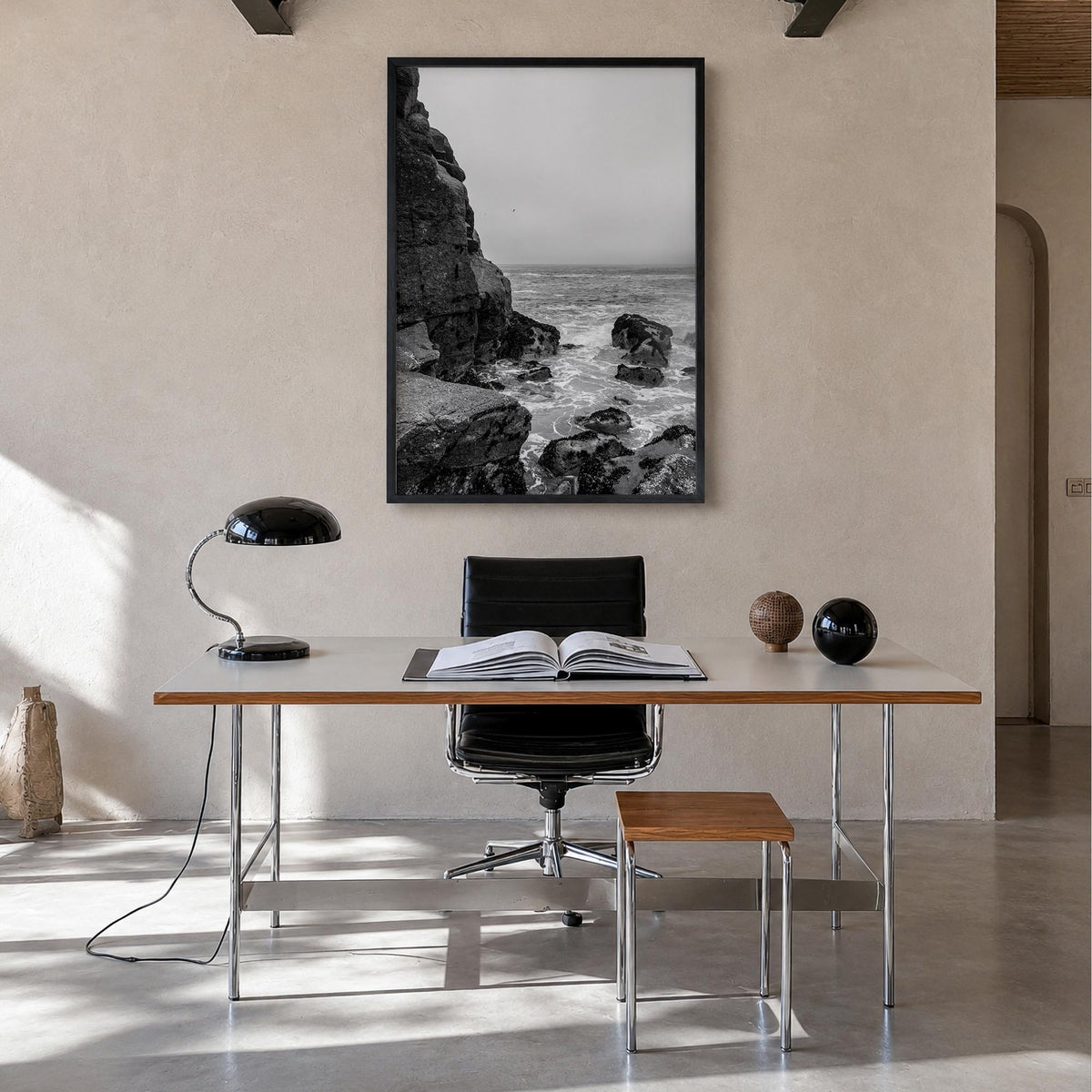 Rocky Coast no. 2 black & white photo poster – vertical wall art in black wood frame, hanging on wall