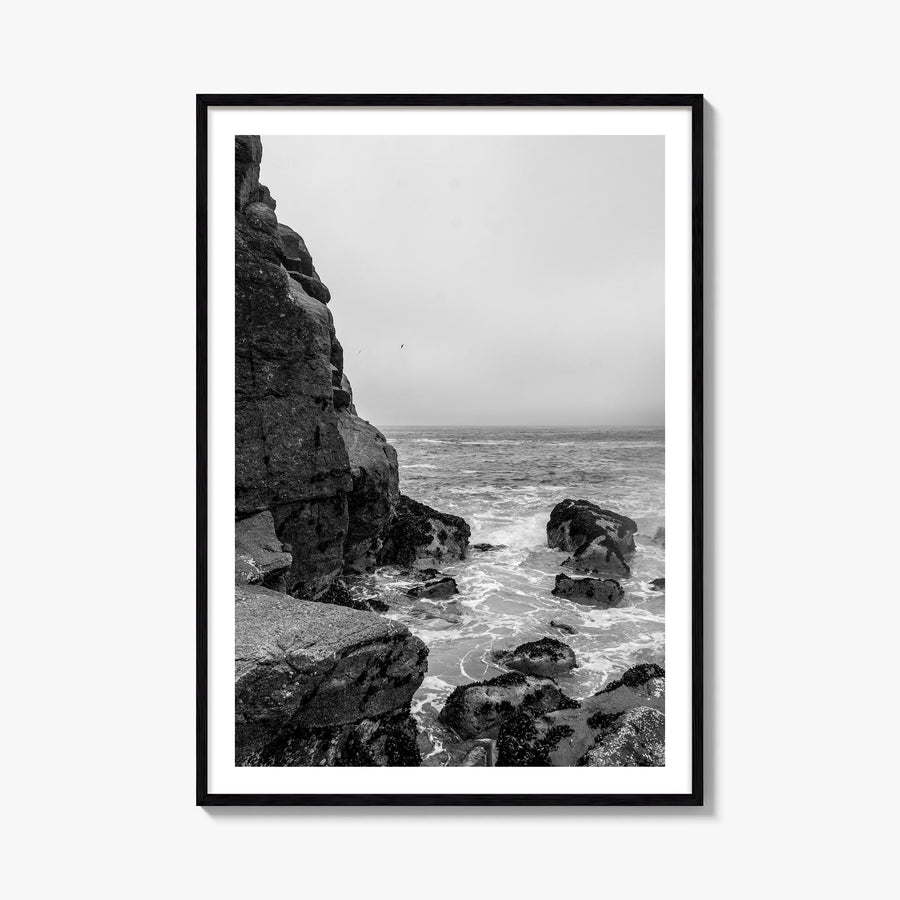 Rocky Coast no. 2 black & white photo poster – vertical wall art, unframed print shown in interior mockup