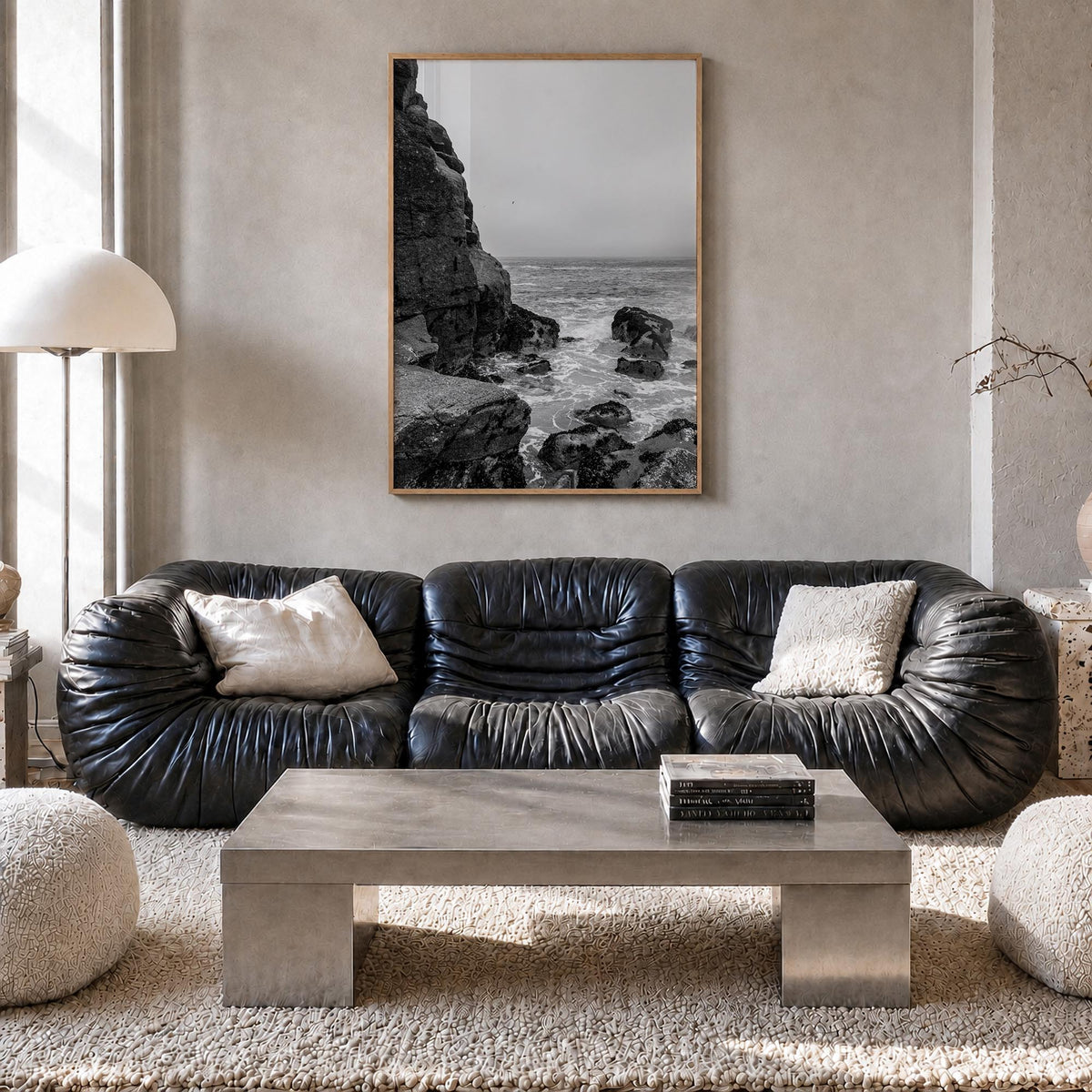 Rocky Coast no. 2 black & white photo poster – vertical wall art in natural wood frame, hanging on wall