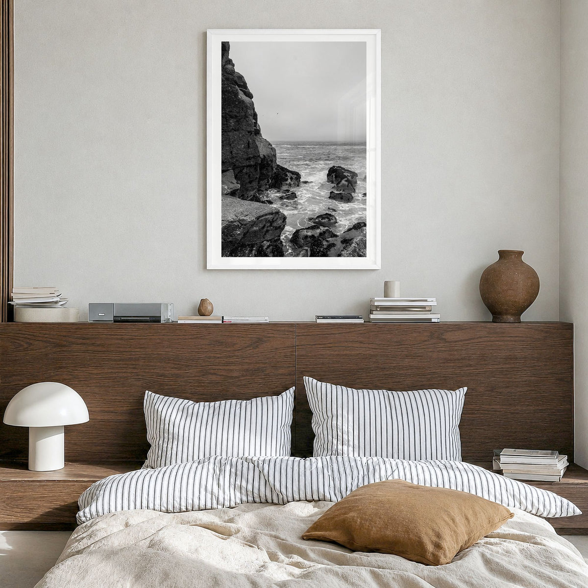 Rocky Coast Photo No 2 Poster in a white wood frame, hanging in a bedroom, white border