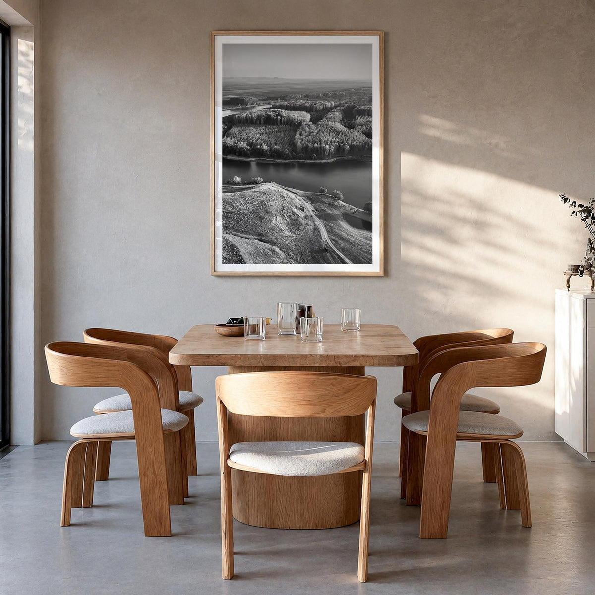 Romania black & white photo poster of Europe – vertical wall art in natural wood frame with white border, hanging on wall