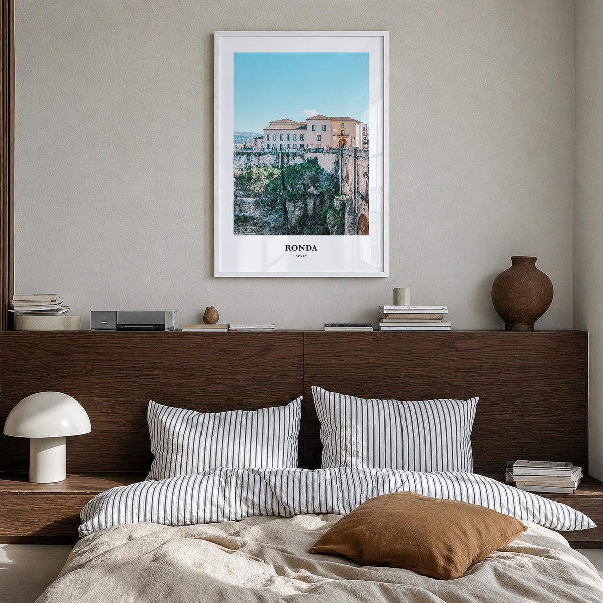 Ronda colorful classic poster of Spain – vertical wall art in white wood frame, hanging on wall