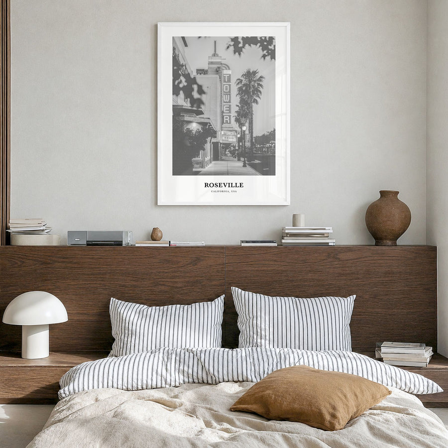 Roseville Classic Poster in a white wood frame, hanging in a bedroom