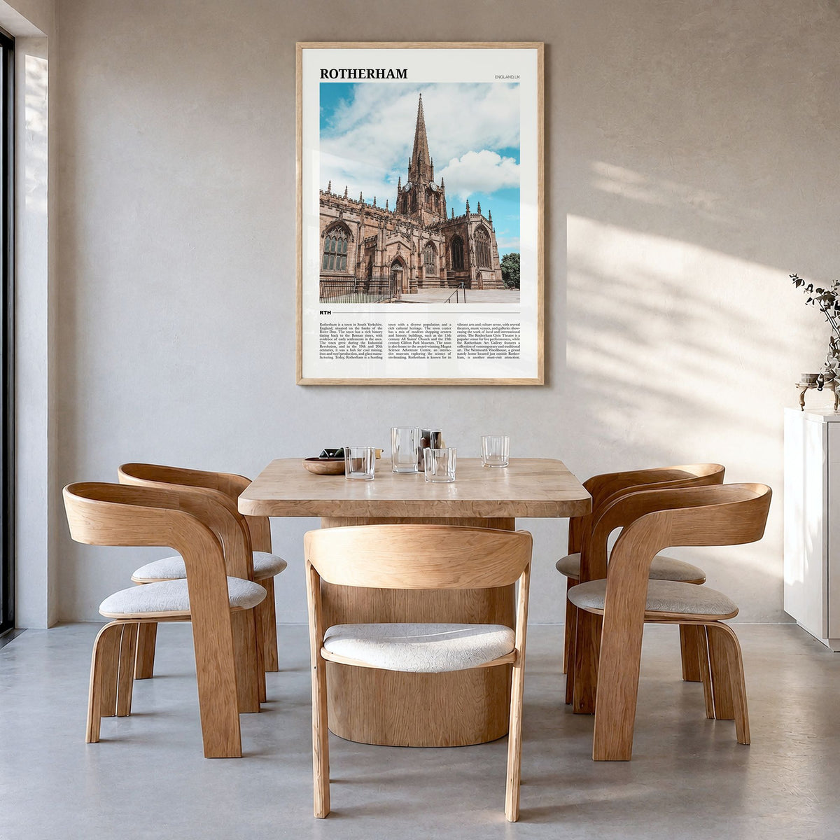 Rotherham Travel Poster in a natural wood frame, hanging in a dining room