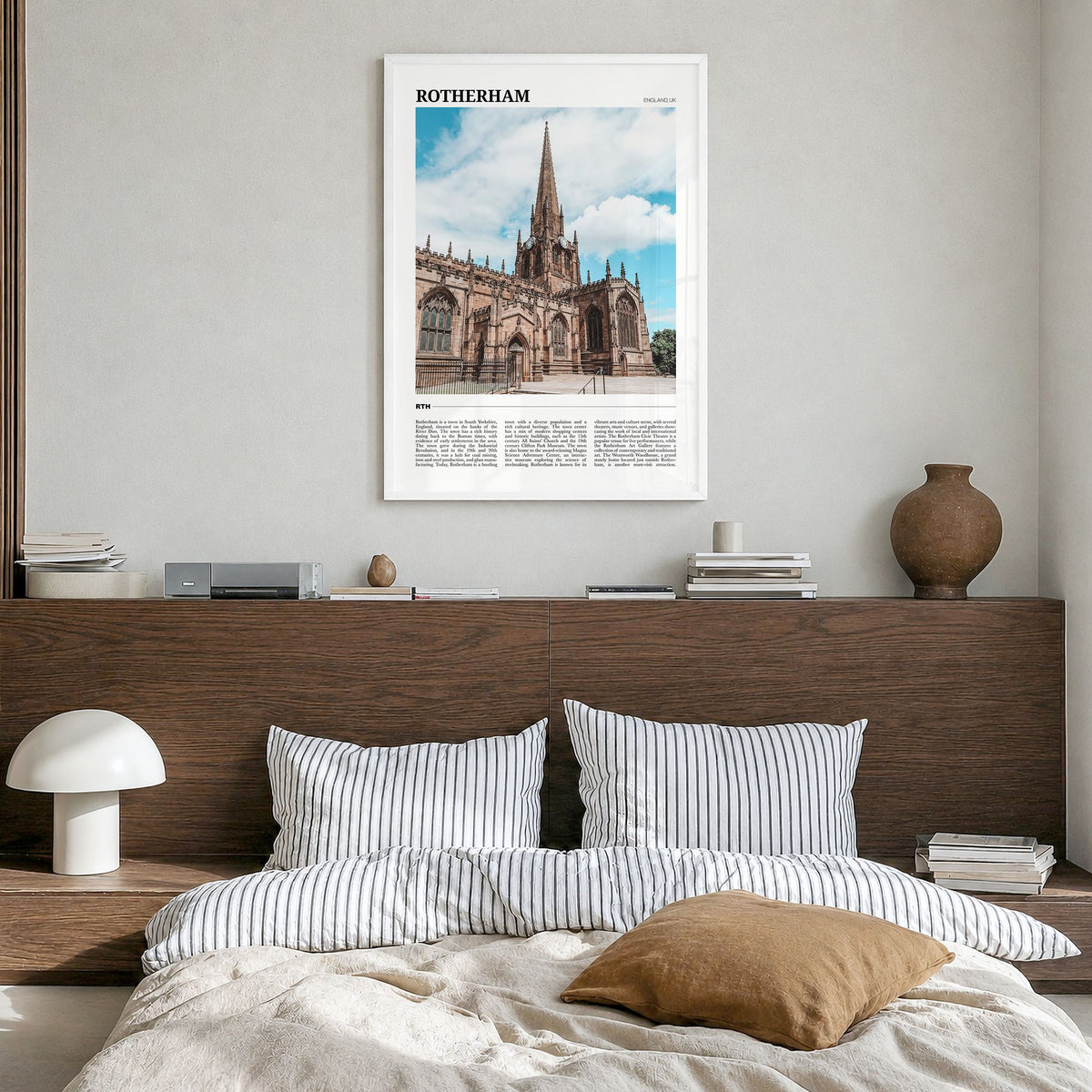 Rotherham Travel Poster in a white wood frame, hanging in a bedroom