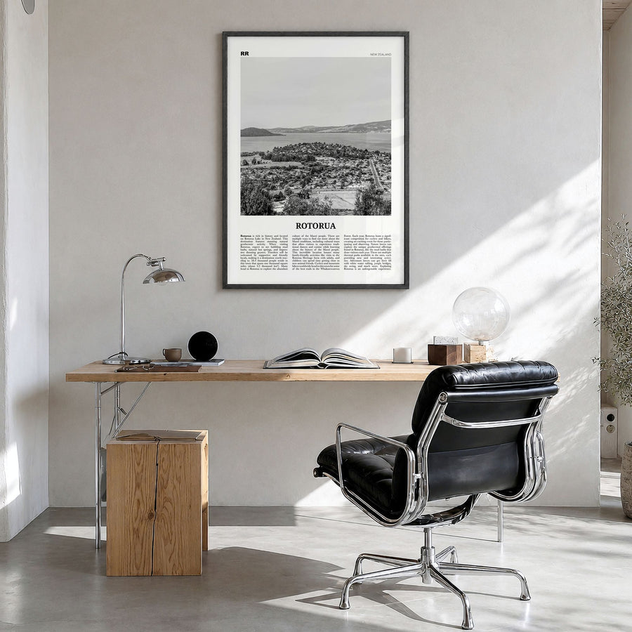 Rotorua Newspaper Poster in a black wood frame, hanging in a bright home office