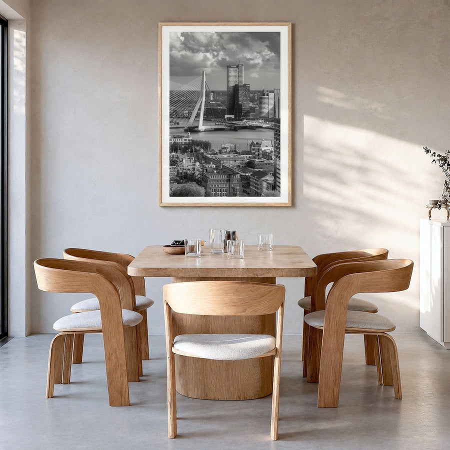 Rotterdam Photo Poster in a natural wood frame, hanging in a dining room, white border