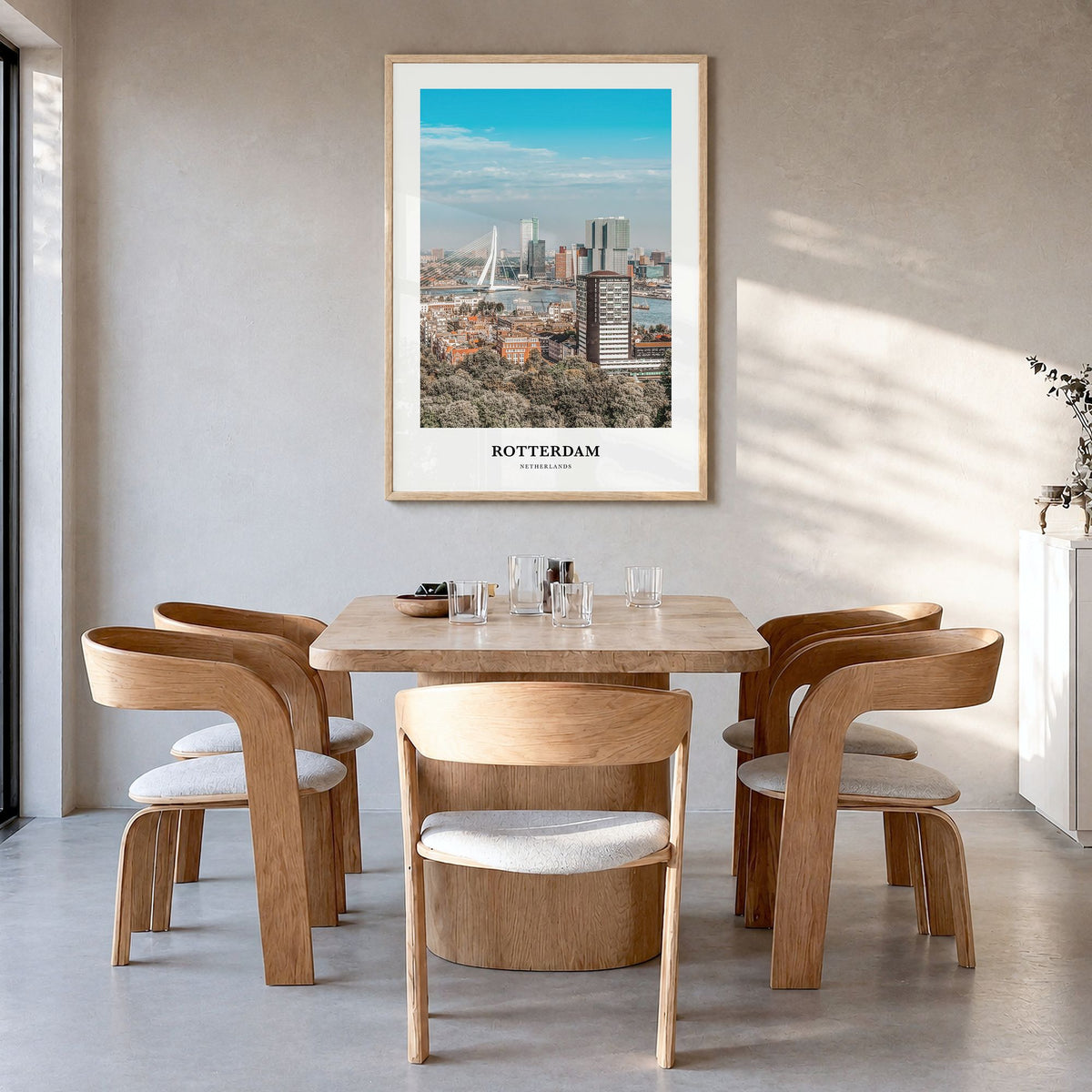 Rotterdam Classic Poster in a natural wood frame, hanging in a dining room