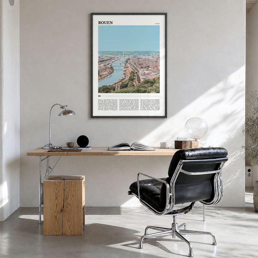 Rouen Travel Poster in a black wood frame, hanging in a bright home office