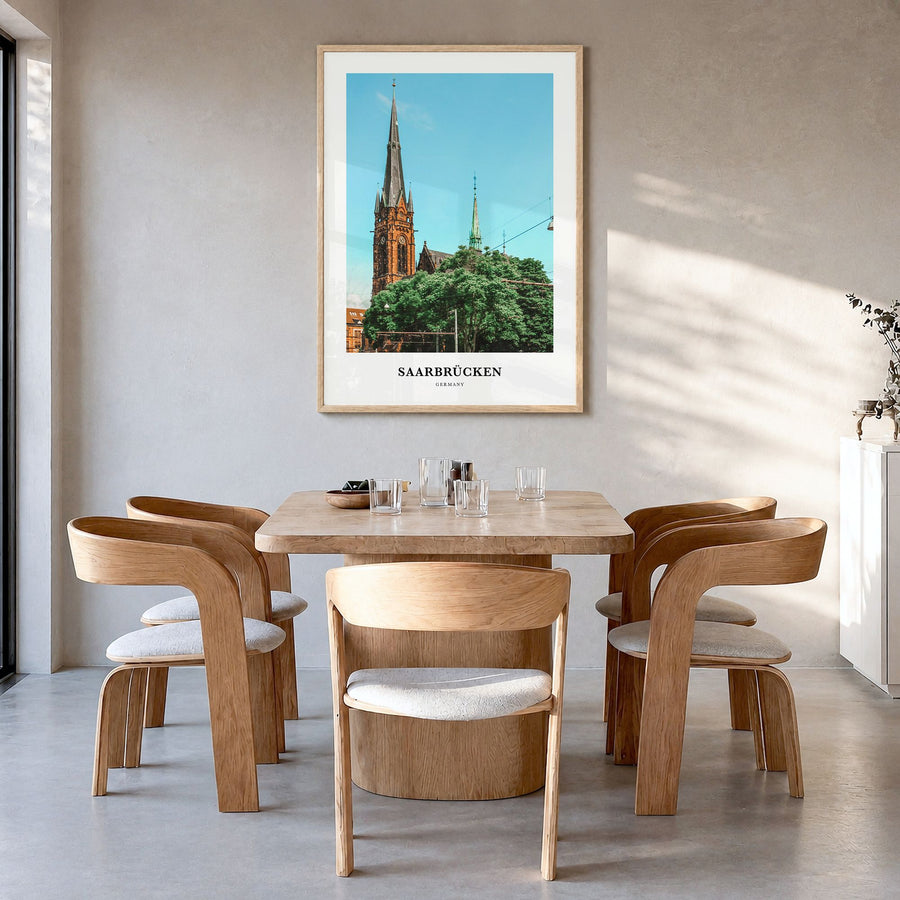 Saarbrücken Classic Poster in a natural wood frame, hanging in a dining room