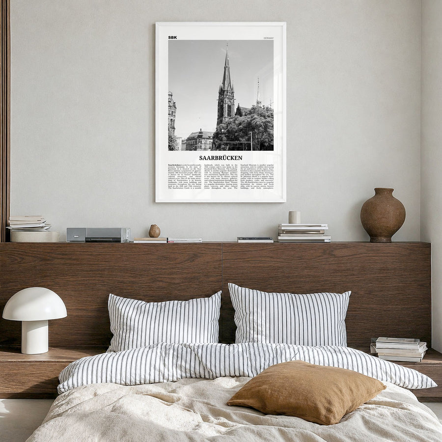 Saarbrücken Newspaper Poster in a white wood frame, hanging in a bedroom