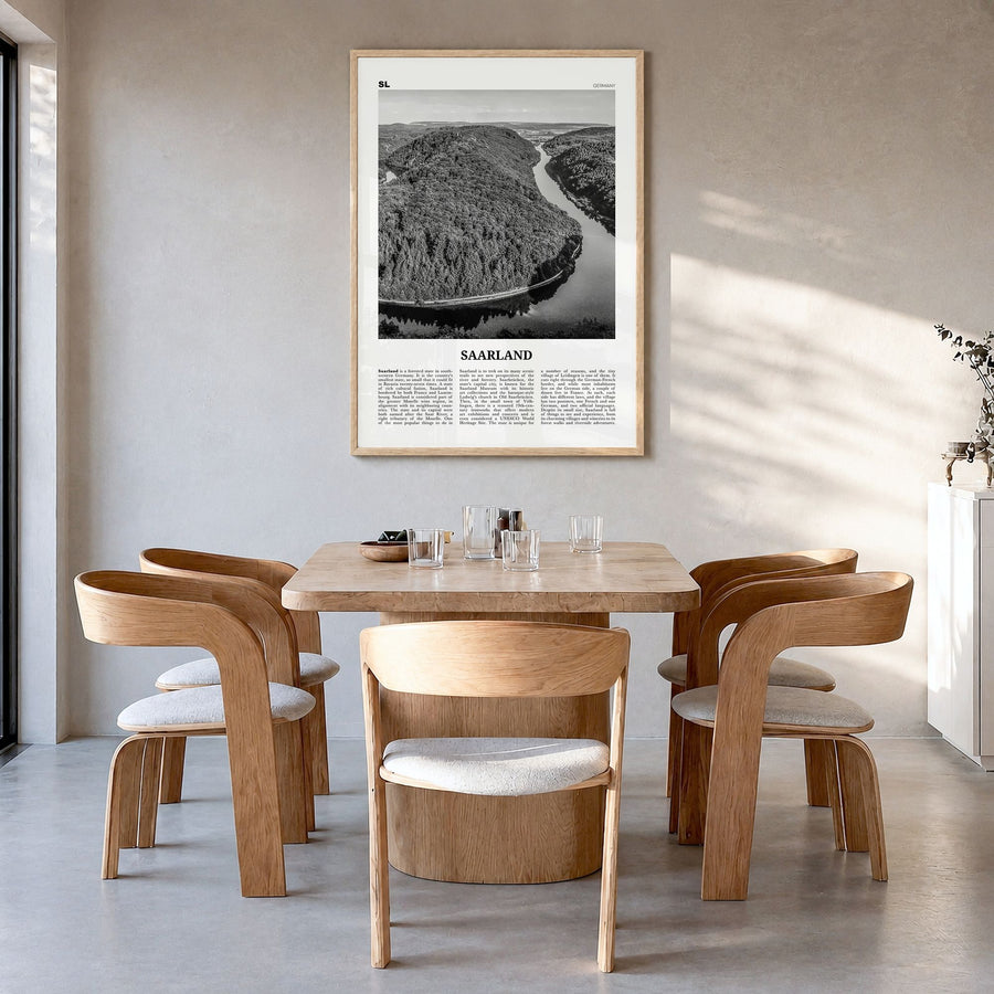 Saarland Newspaper Poster in a natural wood frame, hanging in a dining room
