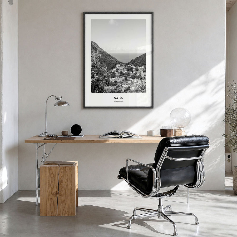 Saba Classic Poster in a black wood frame, hanging in a bright home office