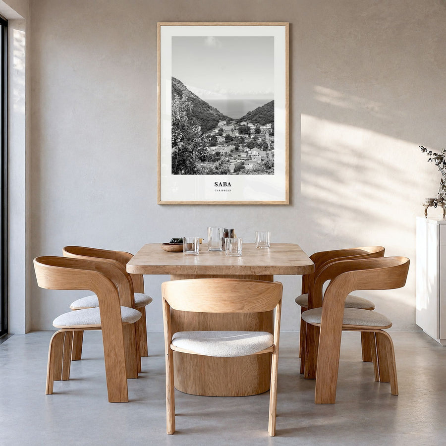 Saba Classic Poster in a natural wood frame, hanging in a dining room